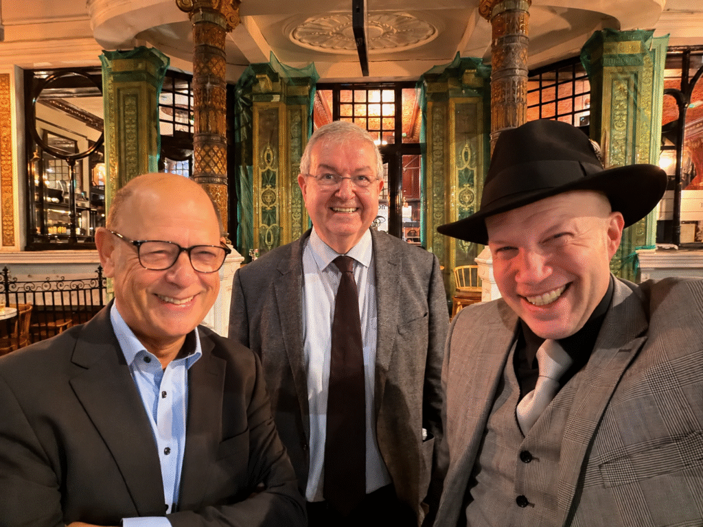 Jon Kaye (middle), Phil Dave (in a hat) and Jeremy Jacobs